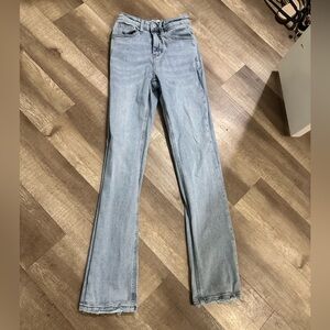 Loveivet by vervet light wash, slightly distressed jeans.